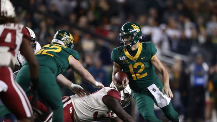 WACO, TEXAS - NOVEMBER 16: Charlie Brewer #12 of the Baylor Bears runs the ball against the Oklahoma Sooners in the first half at McLane Stadium on November 16, 2019 in Waco, Texas. (Photo by Ronald Martinez/Getty Images)