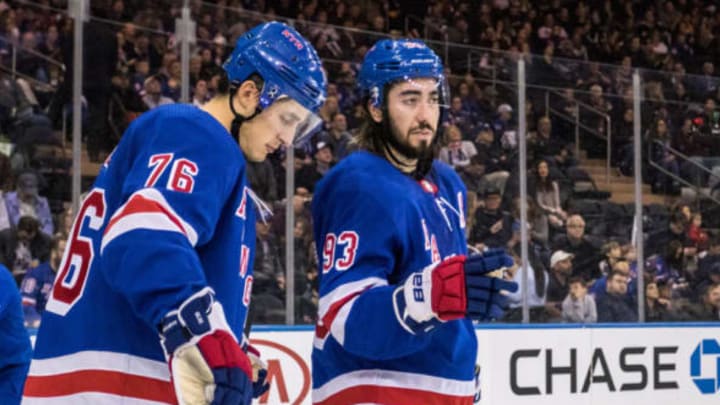 NEW YORK, NY – OCTOBER 20: New York Rangers Center Mika Zibanejad (93) chats with teammate Brady Skjei (76) during the second period of a regular season NHL game between the Vancouver Canucks and the New York Rangers on October 20, 2019, at Madison Square Garden in New York, NY. (Photo by David Hahn/Icon Sportswire via Getty Images)