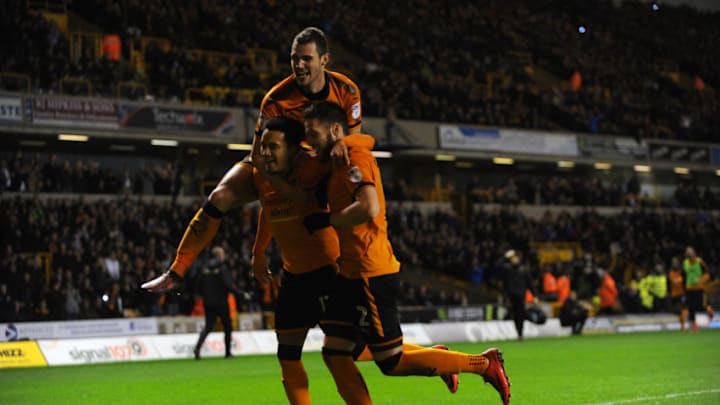 WOLVERHAMPTON, ENGLAND - NOVEMBER 22: Hilder Costa of Wolverhampton Wanderers celebrates with Matt Doherty and Lo Bonatini after scoring a penalty during the Sky Bet Championship match between Wolverhampton Wanderers and Leeds United at Molineux on November 22, 2017 in Wolverhampton, England. (Photo by Nathan Stirk/Getty Images)