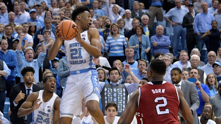 CHAPEL HILL, NC - JANUARY 27: Sterling Manley #21 of the North Carolina Tar Heels steals the inbounds pass with seconds remaining in overtime but then throws it out-of-bounds during their game against the North Carolina State Wolfpack at the Dean Smith Center on January 27, 2018 in Chapel Hill, North Carolina. North Carolina State won 95-91 in overtime. (Photo by Grant Halverson/Getty Images)