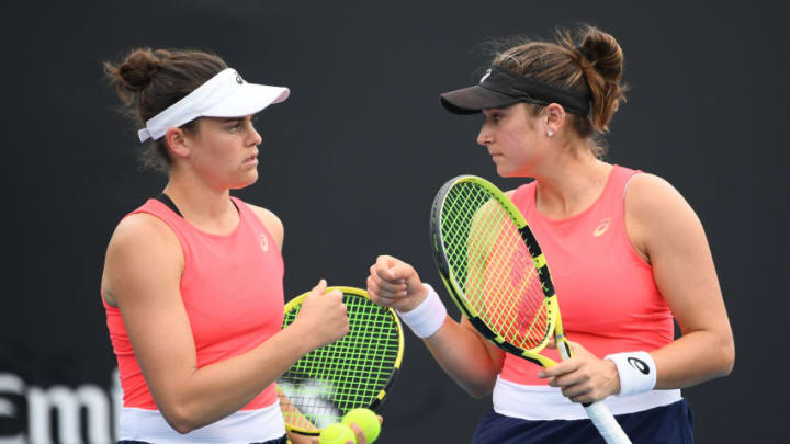 MELBOURNE, AUSTRALIA - JANUARY 22: Jennifer Brady and Caroline Dolehide of the United States talk tactics during their Women's Doubles first round match against Nicole Melichar of the United States and Yifan Xu of China on day three of the 2020 Australian Open at Melbourne Park on January 22, 2020 in Melbourne, Australia. (Photo by Hannah Peters/Getty Images)