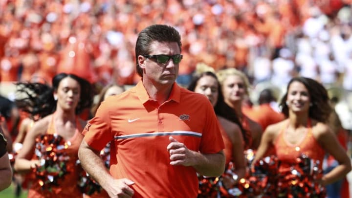STILLWATER, OK - SEPTEMBER 17 : Head Coach Mike Gundy of the Oklahoma State Cowboys takes the field before the game against the Pittsburgh Panthers September 17, 2016 at Boone Pickens Stadium in Stillwater, Oklahoma. Oklahoma State defeated Pitt 45-38. (Photo by Brett Deering/Getty Images)