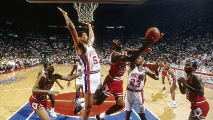 Chicago Bulls guard Michael Jordan (23) is defended by Detroit Pistons center James Edwards Credit: MPS-USA TODAY Sports