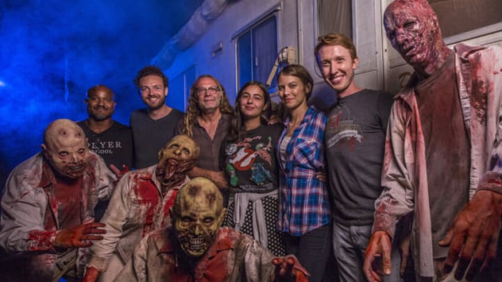 ORLANDO, FL - SEPTEMBER 16: In this handout photo provided by Universal Orlando, cast members from AMC's "The Walking Dead" Lauren Cohan, Alanna Masterson, Seth Gilliam, Ross Marquand and Jordan Woods-Robinson join Greg Nicotero, Executive Producer and Special Effects Makeup Supervisor for the hit show, to experience The Walking Dead haunted house at Universal Orlando's Halloween Horror Nights September 16, 2016 in Orlando, Florida. The group fended off packs of flesh-hungry walkers in instantly-recognizable scenes from Seasons 1 through 6 of AMC's hit series. (Photo by Mariah Wild/Universal Orlando via Getty Images)