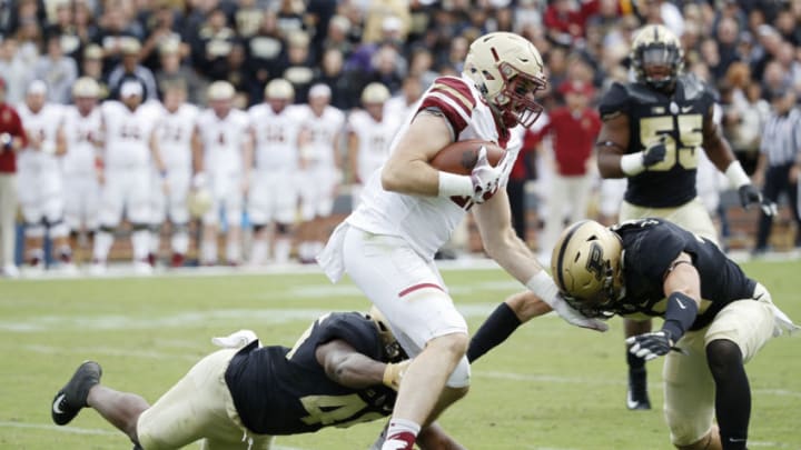 WEST LAFAYETTE, IN - SEPTEMBER 22: Tommy Sweeney #89 of the Boston College Eagles gets tackled after a catch by Cornel Jones #46 and Jacob Thieneman #41 of the Purdue Boilermakers in the second quarter of the game at Ross-Ade Stadium on September 22, 2018 in West Lafayette, Indiana. (Photo by Joe Robbins/Getty Images)