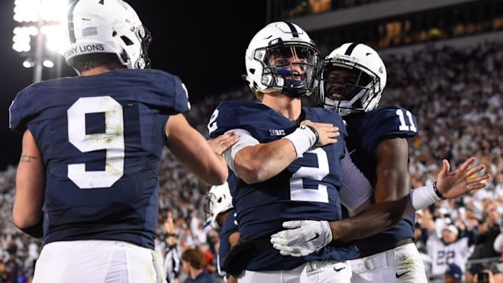 Nov 5, 2016; University Park, PA, USA; Penn State Nittany Lions quarterback Tommy Stevens (2) celebrates his touchdown run with teammates quarterback Trace McSorley (9) and wide receiver Irvin Charles (11) against the Iowa Hawkeyes during the fourth quarter at Beaver Stadium. Penn State defeated Iowa 41-14. Mandatory Credit: Rich Barnes-USA TODAY Sports Nov 5, 2016; University Park, PA, USA; Penn State Nittany Lions quarterback Tommy Stevens (2) celebrates his touchdown run with teammates quarterback Trace McSorley (9) and wide receiver Irvin Charles (11) against the Iowa Hawkeyes during the fourth quarter at Beaver Stadium. Penn State defeated Iowa 41-14. Mandatory Credit: Rich Barnes-USA TODAY Sports