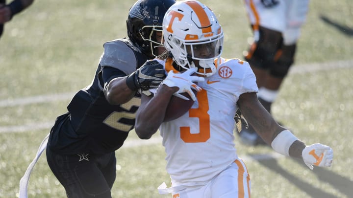 Tennessee running back Eric Gray (3) is stopped by Vanderbilt linebacker Anfernee Orji (26) during the first quarter at Vanderbilt Stadium Saturday, Dec. 12, 2020 in Nashville, Tenn.Gw55651