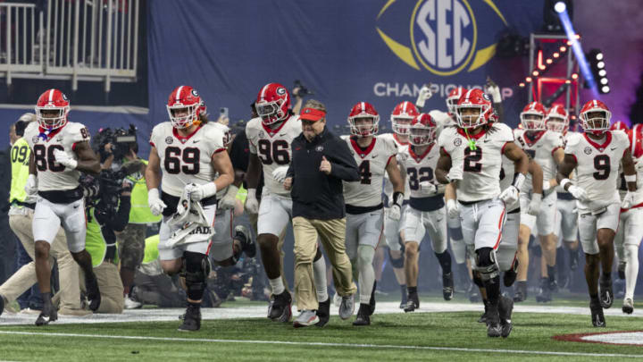 ATLANTA, GEORGIA - DECEMBER 2: Georgia Bulldogs take the field during a game between University of Georgia and University of Alabama at Mercedes-Benz Stadium on December 2, 2023 in Atlanta, Georgia. (Photo by Steve Limentani/ISI Photos/Getty Images)