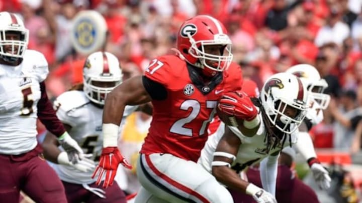 Sep 5, 2015; Athens, GA, USA; Georgia Bulldogs running back Nick Chubb (27) runs for a touchdown against the Louisiana Monroe Warhawks during the first quarter at Sanford Stadium. Mandatory Credit: Dale Zanine-USA TODAY Sports