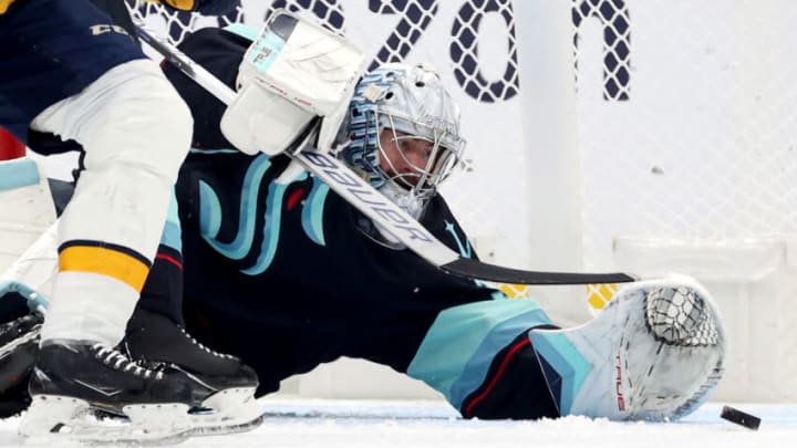 SEATTLE, WASHINGTON - NOVEMBER 02: Philipp Grubauer #31 of the Seattle Kraken makes a save against the Nashville Predators during the second period at Climate Pledge Arena on November 02, 2023 in Seattle, Washington. (Photo by Steph Chambers/Getty Images)