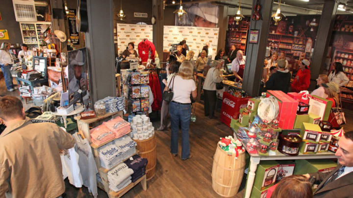 NASHVILLE, TN - NOVEMBER 10: Shoppers look over the Cracker Barrel exclusive Alan Jackson merchandise prior to an Alan Jackson meet & greet at The Cracker Barrel 'Pop Up' Old Country Store on November 10, 2009 in Nashville, Tennessee. (Photo by Frederick Breedon/Getty Images for Cracker Barrel)