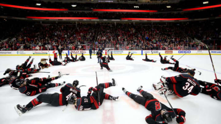 RALEIGH, NC – JANUARY 04: Players of the Carolina Hurricanes participate in their Storm Surge celebration following an NHL game against the Columbus Blue Jackets on January 4, 2019 at PNC Arena in Raleigh, North Carolina. (Photo by Gregg Forwerck/NHLI via Getty Images)