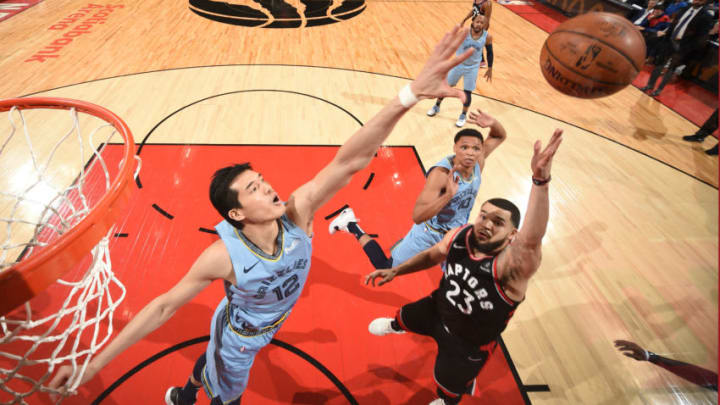 TORONTO, CANADA - JANUARY 19: Fred VanVleet #23 of the Toronto Raptors drives to the basket against Yuta Watanabe #12 of the Memphis Grizzlies on January 19, 2019 at the Scotiabank Arena in Toronto, Ontario, Canada. NOTE TO USER: User expressly acknowledges and agrees that, by downloading and or using this Photograph, user is consenting to the terms and conditions of the Getty Images License Agreement. Mandatory Copyright Notice: Copyright 2019 NBAE (Photo by Ron Turenne/NBAE via Getty Images)