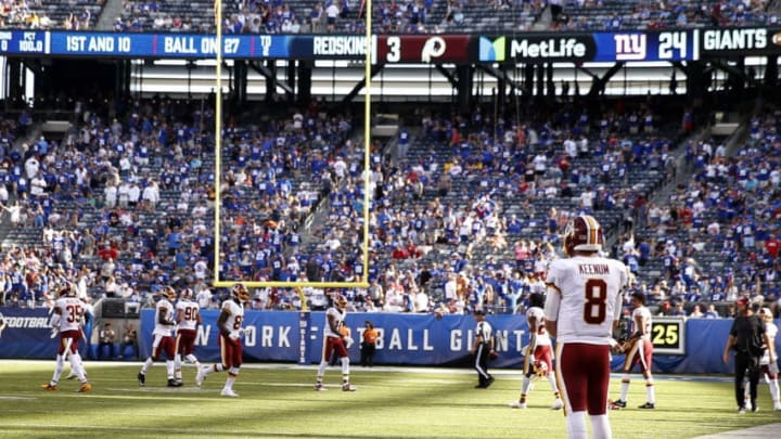 EAST RUTHERFORD, NEW JERSEY - SEPTEMBER 29: Case Keenum #8 of the Washington Redskins stands on the sideline in the second half against the New York Giants at MetLife Stadium on September 29, 2019 in East Rutherford, New Jersey. (Photo by Elsa/Getty Images)