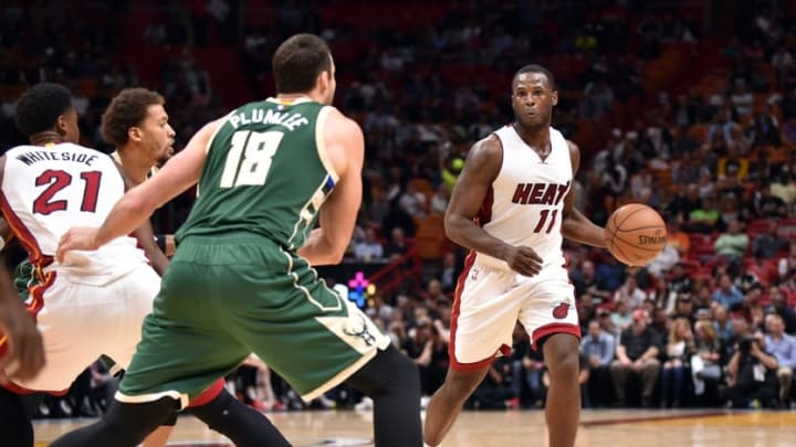 Nov 17, 2016; Miami, FL, USA; Miami Heat guard Dion Waiters (11) is pressured by Milwaukee Bucks center Miles Plumlee (18) during the second half at American Airlines Arena. The Heat won 96-73. Mandatory Credit: Steve Mitchell-USA TODAY Sports