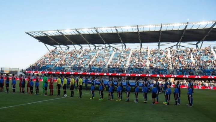 Jul 16, 2016; San Jose, CA, USA; Starting eleven for Toronto FC and San Jose Earthquakes on the field with youth escorts before the game at Avaya Stadium. Mandatory Credit: Kelley L Cox-USA TODAY Sports