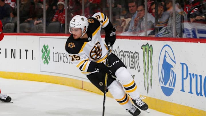 NEWARK, NJ - NOVEMBER 19: Connor Clifton #75 of the Boston Bruins plays the puck during the game against the New Jersey Devils at the Prudential Center on November 19, 2019 in Newark, New Jersey. (Photo by Andy Marlin/NHLI via Getty Images)