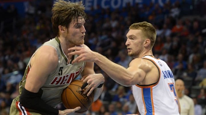 Nov 7, 2016; Oklahoma City, OK, USA; Oklahoma City Thunder forward Domantas Sabonis (3) fouls Miami Heat forward Luke Babbitt (5) during the second quarter at Chesapeake Energy Arena. Mandatory Credit: Mark D. Smith-USA TODAY Sports