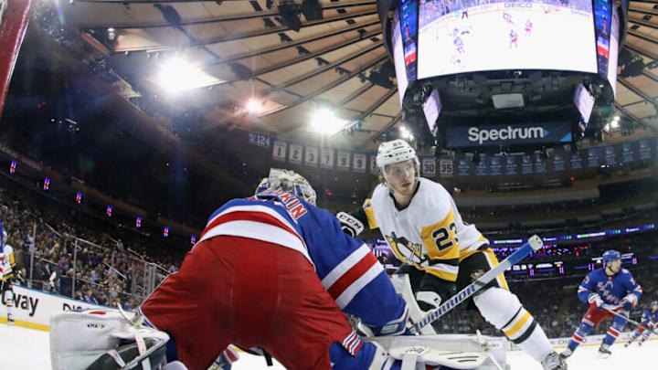 NEW YORK, NEW YORK - MAY 11: Brock McGinn #23 of the Pittsburgh Penguins skates against Igor Shesterkin #31 of the New York Rangers in Game Five of the First Round of the 2022 Stanley Cup Playoffs at Madison Square Garden on May 11, 2022 in New York City. (Photo by Bruce Bennett/Getty Images)