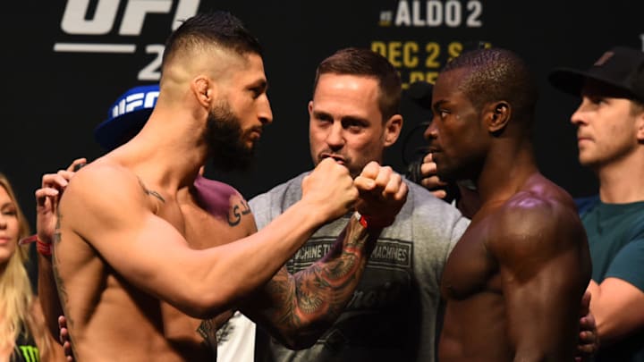 DETROIT, MI - DECEMBER 01: (L-R) Sabah Homasi and Abdul Razak Alhassan of Ghana face off during the UFC 218 weigh-in inside Little Caesars Arena on December 1, 2017 in Detroit, Michigan. (Photo by Josh Hedges/Zuffa LLC/Zuffa LLC via Getty Images)