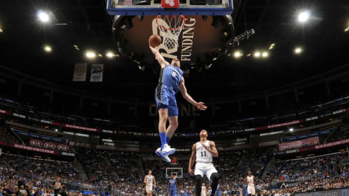 ORLANDO, FL - OCTOBER 27: Mario Hezonja #8 of the Orlando Magic drives to the basket against the San Antonio Spurs on October 27, 2017 at Amway Center in Orlando, Florida. NOTE TO USER: User expressly acknowledges and agrees that, by downloading and or using this photograph, User is consenting to the terms and conditions of the Getty Images License Agreement. Mandatory Copyright Notice: Copyright 2017 NBAE (Photo by Fernando Medina/NBAE via Getty Images)