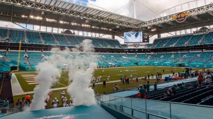 Miami Dolphins enter the field after the National Anthem at Hard Rock Stadium in Miami Gardens, October 18, 2020. [ALLEN EYESTONE/The Palm Beach Post]