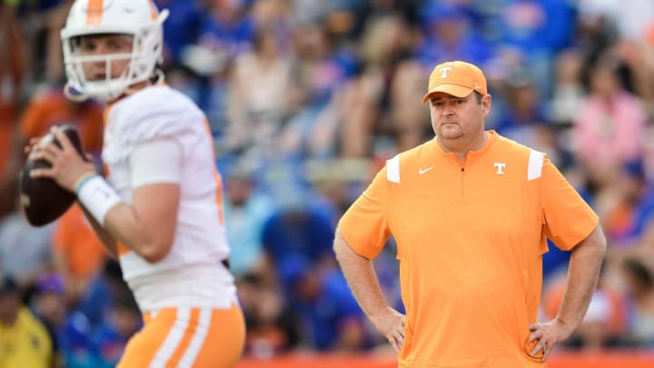 Tennessee Head Coach Josh Heupel watches as Tennessee quarterback Harrison Bailey (15) warms up during a game at Ben Hill Griffin Stadium in Gainesville, Fla. on Saturday, Sept. 25, 2021.Kns Tennessee Florida Football