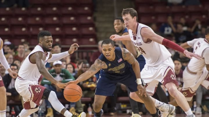 Feb 27, 2016; Chestnut Hill, MA, USA; Boston College Eagles guard Eli Carter (3) and Georgia Tech Yellow Jackets guard Marcus Georges-Hunt (3) compete for the loose ball during the 2nd half of the game at Silvio O. Conte Forum. Georgia Tech won the game 76-71. Mandatory Credit: Gregory J. Fisher-USA TODAY Sports