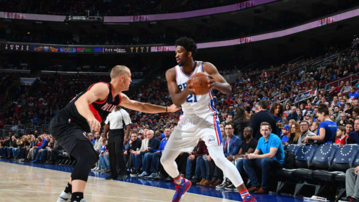 PHILADELPHIA, PA - JANUARY 20: Joel Embiid #21 of the Philadelphia 76ers handles the ball during a game against the Portland Trail Blazers on January 20, 2017 at the Wells Fargo Center in Philadelphia, Pennsylvania. NOTE TO USER: User expressly acknowledges and agrees that, by downloading and/or using this photograph, user is consenting to the terms and conditions of the Getty Images License Agreement. Mandatory Copyright Notice: Copyright 2017 NBAE (Photo by Jesse D. Garrabrant/NBAE via Getty Images)