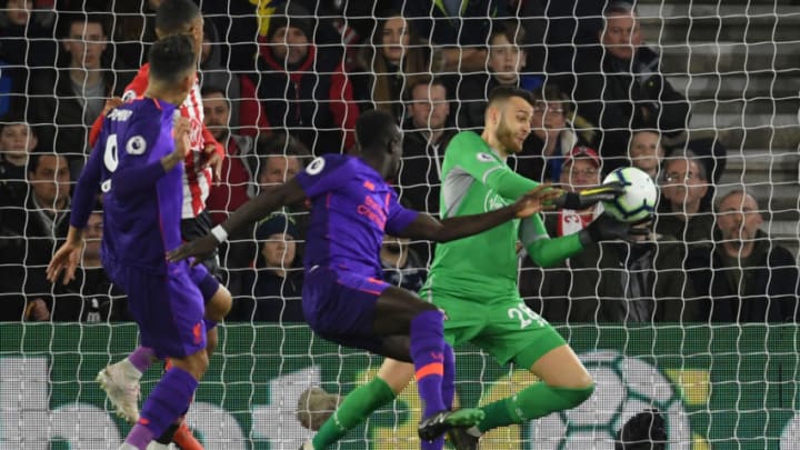 SOUTHAMPTON, ENGLAND – APRIL 05: Angus Gunn of Southampton saves a shot from Sadio Mane of Liverpool during the Premier League match between Southampton FC and Liverpool FC at St Mary’s Stadium on April 05, 2019 in Southampton, United Kingdom. (Photo by Mike Hewitt/Getty Images)