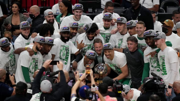 The Boston Celtics celebrates with the Eastern Conference Bob Cousy champions trophy (Photo by Eric Espada/Getty Images)