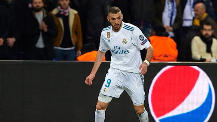 PARIS, FRANCE – MARCH 06: Karim Benzema of Real Madrid runs with the ball during the UEFA Champions League Round of 16 Second Leg match between Paris Saint-Germain and Real Madrid at Parc des Princes on March 6, 2018 in Paris, France. (Photo by Manuel Queimadelos Alonso/Getty Images)