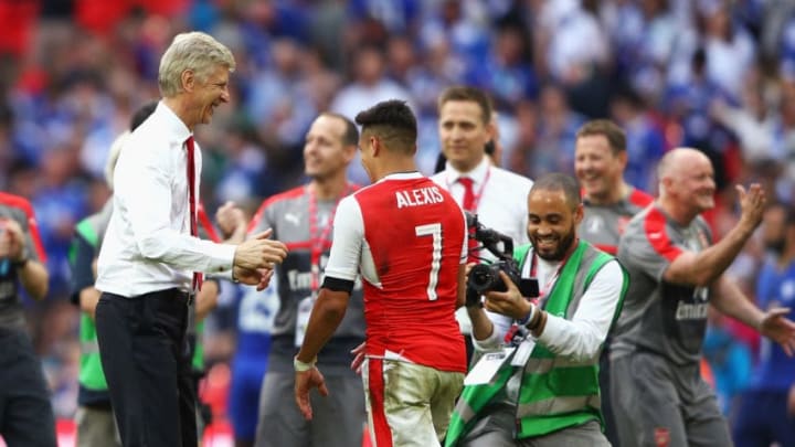 LONDON, ENGLAND - MAY 27: Arsene Wenger, Manager of Arsenal and Alexis Sanchez of Arsenal celebrate after The Emirates FA Cup Final between Arsenal and Chelsea at Wembley Stadium on May 27, 2017 in London, England. (Photo by Ian Walton/Getty Images)