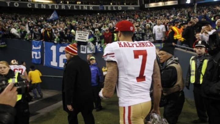 Jan 19, 2014; Seattle, WA, USA; San Francisco 49ers quarterback Colin Kaepernick (7) leaves the field after the 2013 NFC Championship football game against the Seattle Seahawks at CenturyLink Field. Mandatory Credit: Joe Nicholson-USA TODAY Sports