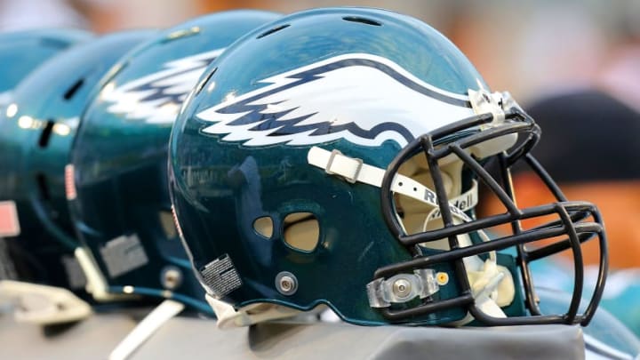 JACKSONVILLE, FL - AUGUST 24: A row of Philadelphia Eagles helmets rest on the sidelines before a game against the Jacksonville Jaguars at EverBank Field on August 24, 2013 in Jacksonville, Florida. (Photo by Brian Cleary/Getty Images)