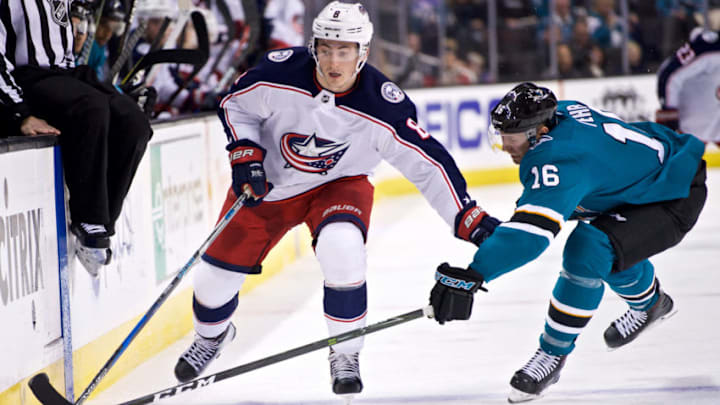 SAN JOSE, CA - MARCH 4: Blue Jackets defenseman Zach Werenski (8) gets by Sharks center Eric Fehr (16) during the NHL game between the San Jose Sharks and the Columbus Blue Jackets on March 4, 2018, at the SAP Center in San Jose, CA. (Photo by Matt Cohen/Icon Sportswire via Getty Images)