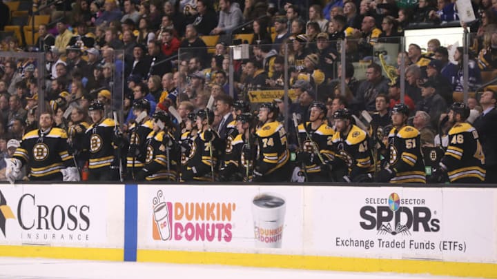 BOSTON - FEBRUARY 3: Boston Bruins players standing on the bench after it was announced that teammate defenseman Zdeno Chara (33) in playing in his 1,400 NHL game during action against the Toronto Maple Leafs during first period action at TD Garden in Boston on Feb. 3, 2018. (Photo by Matthew J. Lee/The Boston Globe via Getty Images)