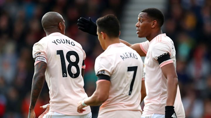 BOURNEMOUTH, ENGLAND - NOVEMBER 03: Anthony Martial of Manchester United celebrates after scoring his team's first goal with Alexis Sanchez of Manchester United and Ashley Young of Manchester United during the Premier League match between AFC Bournemouth and Manchester United at Vitality Stadium on November 3, 2018 in Bournemouth, United Kingdom. (Photo by Catherine Ivill/Getty Images)