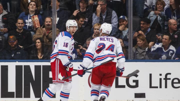TORONTO, ON - MARCH 23: Ryan Strome #16 of the New York Rangers celebrates with teammate Boo Nieves #24 after scoring the over-time winning goal against the Toronto Maple Leafs at the Scotiabank Arena on March 23, 2019 in Toronto, Ontario, Canada. (Photo by Mark Blinch/NHLI via Getty Images)