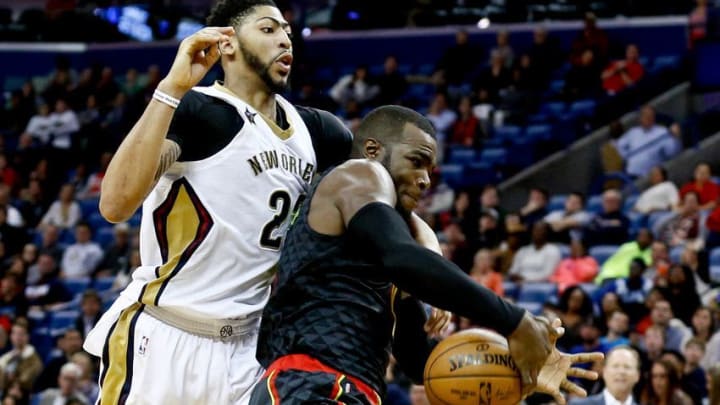 Jan 5, 2017; New Orleans, LA, USA; New Orleans Pelicans forward Anthony Davis (23) knocks the ball away from Atlanta Hawks forward Paul Millsap (4) on a fast break during the fourth quarter of a game at the Smoothie King Center. The Hawks defeated the Pelicans 99-94. Mandatory Credit: Derick E. Hingle-USA TODAY Sports