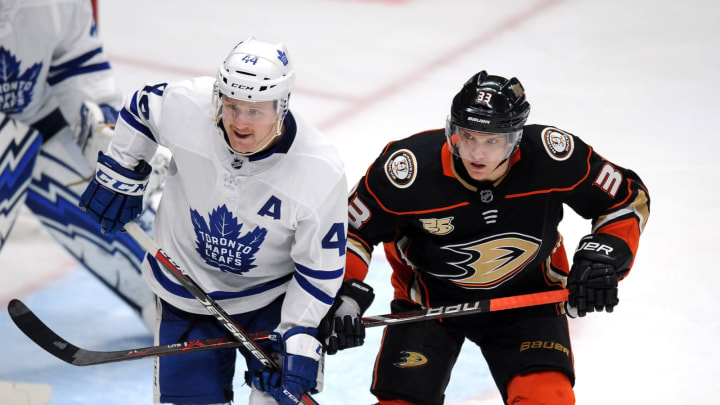 ANAHEIM, CA – NOVEMBER 16: Toronto Maple Leafs defenseman Morgan Rielly (44) and Anaheim Ducks rightwing Jakob Silfverberg (33) in action in front of the Leafs net during the second period of a game played on November 16, 2018 at the Honda Center in Anaheim, CA. (Photo by John Cordes/Icon Sportswire via Getty Images)