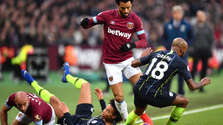 LONDON, ENGLAND - NOVEMBER 24: Felipe Anderson of West Ham United takes on Fabian Delph of Manchester City, after Pablo Zabaleta of West Ham United is challenged by Leroy Sane of Manchester City during the Premier League match between West Ham United and Manchester City at London Stadium on November 24, 2018 in London, United Kingdom. (Photo by Justin Setterfield/Getty Images)