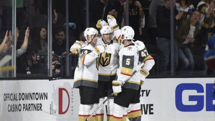 LAS VEGAS, NV - OCTOBER 27: (L-R) Oscar Lindberg #24, Tomas Nosek #92, Deryk Engelland #5 and Luca Sbisa #47 of the Vegas Golden Knights celebrate after scoring a goal against the Colorado Avalanche during the game at T-Mobile Arena on October 27, 2017 in Las Vegas, Nevada. (Photo by David Becker/NHLI via Getty Images)