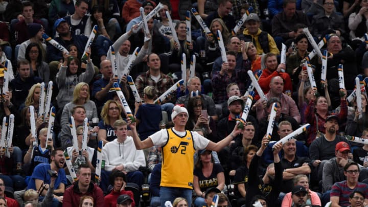 SALT LAKE CITY, UT - DECEMBER 23: Utah Jazz fans try to disrupt an Oklahoma City Thunder free throw attempt in the second half of the 103-89 win by the Thunder at Vivint Smart Home Arena on December 23, 2017 in Salt Lake City, Utah. (Photo by Gene Sweeney Jr./Getty Images)