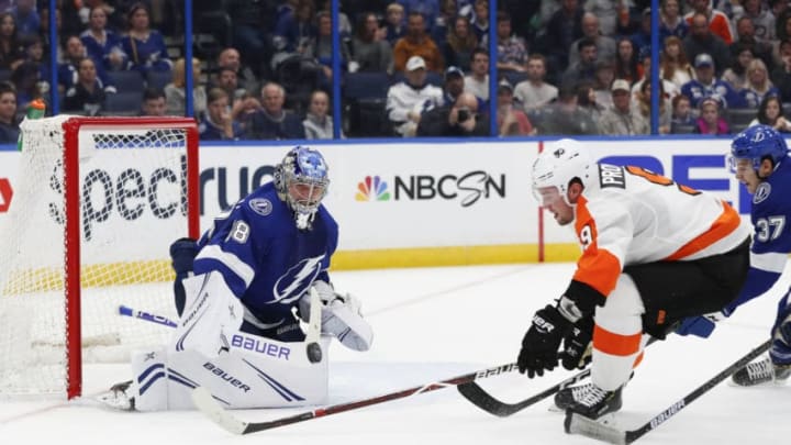 TAMPA, FL - DECEMBER 27: Tampa Bay Lightning goaltender Andrei Vasilevskiy (88) makes a save on a shot from Philadelphia Flyers defenseman Ivan Provorov (9) in the first period of the NHL game between the Philadelphia Flyers and Tampa Bay Lightning on December 27, 2018 at Amalie Arena in Tampa, FL. (Photo by Mark LoMoglio/Icon Sportswire via Getty Images)