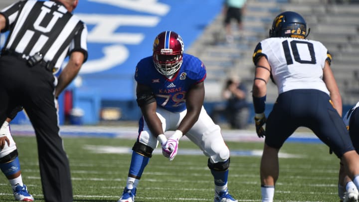 Hakeem Adeniji #78 of the Kansas Jayhawks (Photo by Ed Zurga/Getty Images)