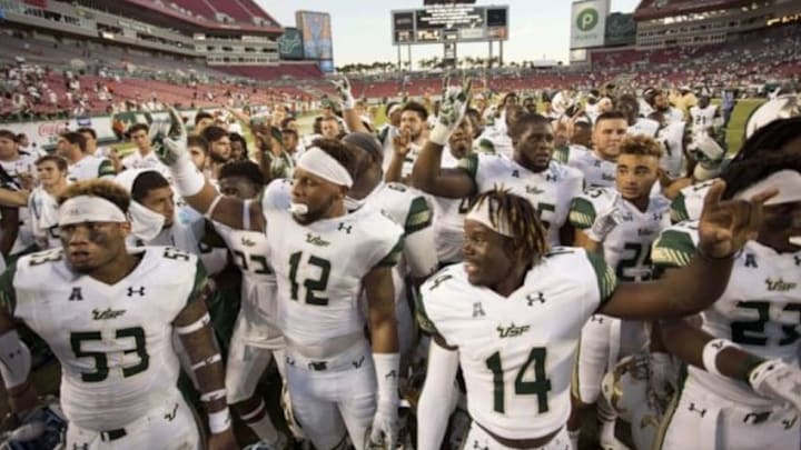 Oct 10, 2015; Tampa, FL, USA; The South Florida Bulls celebrate a win over Syracuse Orange at Raymond James Stadium. The South Florida Bulls won 45-24. Mandatory Credit: Logan Bowles-USA TODAY Sports Oct 10, 2015; Tampa, FL, USA; The South Florida Bulls celebrate a win over Syracuse Orange at Raymond James Stadium. The South Florida Bulls won 45-24. Mandatory Credit: Logan Bowles-USA TODAY Sports