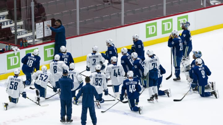 VANCOUVER, BC - JANUARY 4: Head coach Travis Green of the Vancouver Canucks draws up a drill on the whiteboard on the first day of the Vancouver Canucks NHL Training Camp at Rogers Arena on January 4, 2021 in Vancouver, British Columbia, Canada. (Photo by Rich Lam/Getty Images)