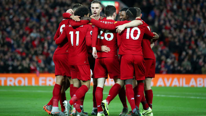 LIVERPOOL, ENGLAND - JANUARY 02: Mohamed Salah of Liverpool celebrates with his team mates after scoring his team's first goal during the Premier League match between Liverpool FC and Sheffield United at Anfield on January 02, 2020 in Liverpool, United Kingdom. (Photo by Clive Brunskill/Getty Images)