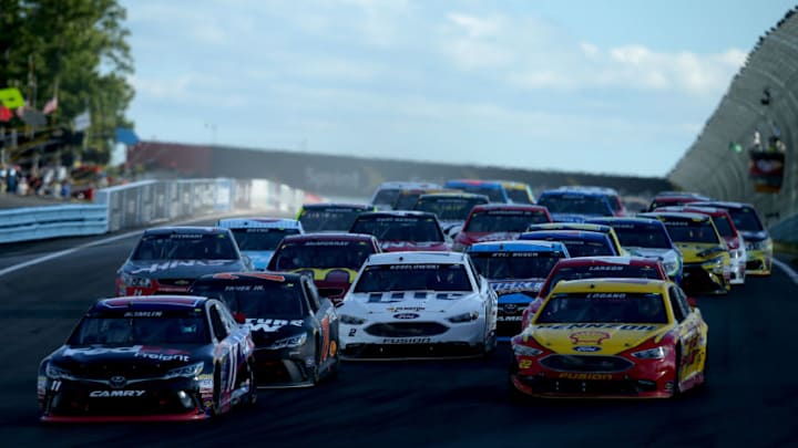 WATKINS GLEN, NY - AUGUST 07: Denny Hamlin, driver of the #11 FedEx Freight Toyota, leads Martin Truex Jr., driver of the #78 Furniture Row Toyota, during the NASCAR Sprint Cup Series Cheez-It 355 at Watkins Glen International on August 7, 2016 in Watkins Glen, New York. (Photo by Sean Gardner/Getty Images)